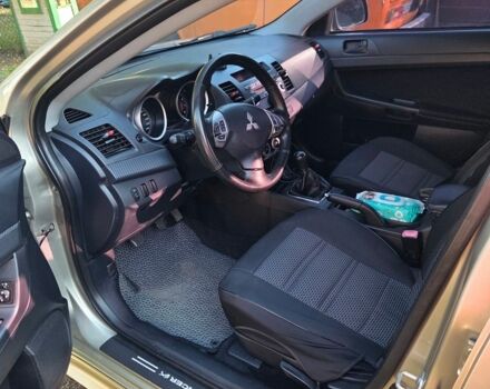 Бежевий Міцубісі Lancer, об'ємом двигуна 2 л та пробігом 225 тис. км за 5500 $, фото 1 на Automoto.ua