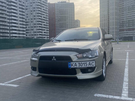 Бежевий Міцубісі Lancer, об'ємом двигуна 2 л та пробігом 290 тис. км за 6600 $, фото 1 на Automoto.ua