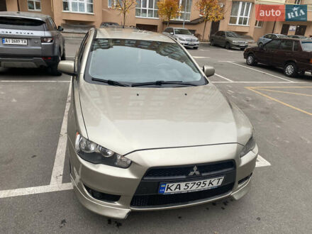 Бежевий Міцубісі Lancer, об'ємом двигуна 2 л та пробігом 173 тис. км за 7500 $, фото 1 на Automoto.ua