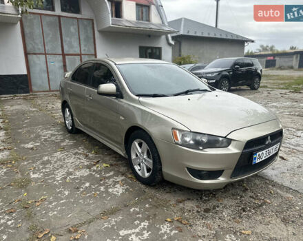 Бежевий Міцубісі Lancer, об'ємом двигуна 2 л та пробігом 312 тис. км за 4700 $, фото 1 на Automoto.ua