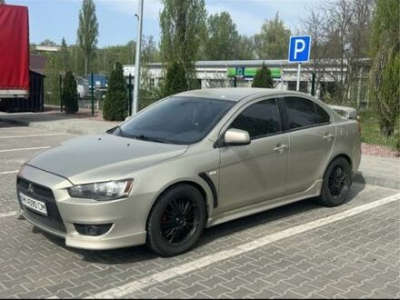 Бежевий Міцубісі Lancer, об'ємом двигуна 2 л та пробігом 260 тис. км за 7100 $, фото 1 на Automoto.ua