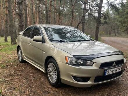 Бежевий Міцубісі Lancer, об'ємом двигуна 2 л та пробігом 262 тис. км за 6500 $, фото 1 на Automoto.ua