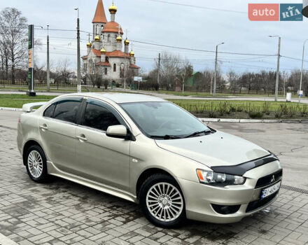 Бежевий Міцубісі Lancer, об'ємом двигуна 2 л та пробігом 262 тис. км за 6000 $, фото 1 на Automoto.ua