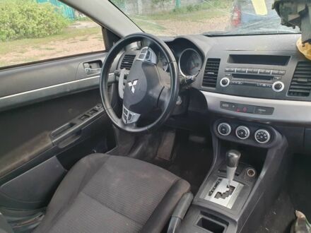 Бежевий Міцубісі Lancer, об'ємом двигуна 2 л та пробігом 180 тис. км за 3000 $, фото 1 на Automoto.ua