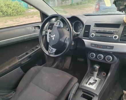 Бежевий Міцубісі Lancer, об'ємом двигуна 2 л та пробігом 180 тис. км за 3000 $, фото 1 на Automoto.ua