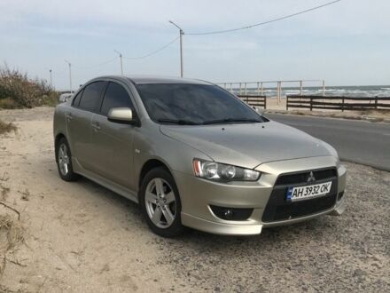 Бежевий Міцубісі Lancer, об'ємом двигуна 2 л та пробігом 280 тис. км за 6500 $, фото 1 на Automoto.ua