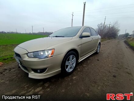 Бежевый Мицубиси Лансер, объемом двигателя 2 л и пробегом 160 тыс. км за 6500 $, фото 1 на Automoto.ua