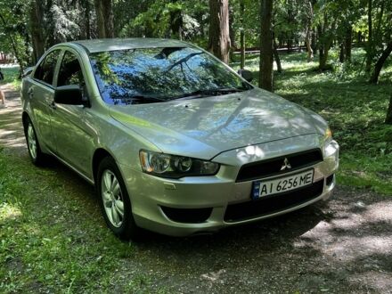 Бежевий Міцубісі Lancer, об'ємом двигуна 1.5 л та пробігом 200 тис. км за 5200 $, фото 1 на Automoto.ua