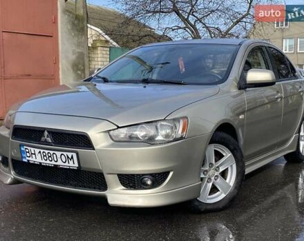 Бежевый Мицубиси Лансер, объемом двигателя 2 л и пробегом 239 тыс. км за 6800 $, фото 1 на Automoto.ua