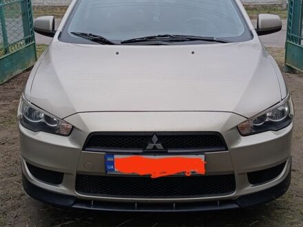 Бежевий Міцубісі Lancer, об'ємом двигуна 0.15 л та пробігом 267 тис. км за 6300 $, фото 1 на Automoto.ua