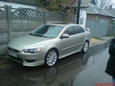 Бежевый Мицубиси Лансер, объемом двигателя 2 л и пробегом 205 тыс. км за 7000 $, фото 1 на Automoto.ua