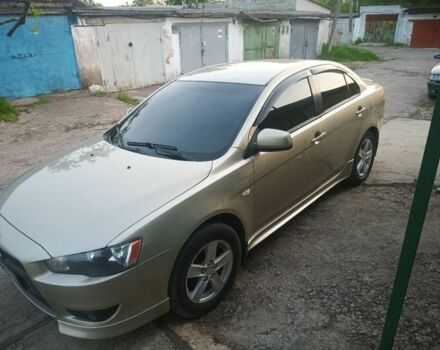 Бежевий Міцубісі Lancer, об'ємом двигуна 2 л та пробігом 195 тис. км за 8000 $, фото 1 на Automoto.ua