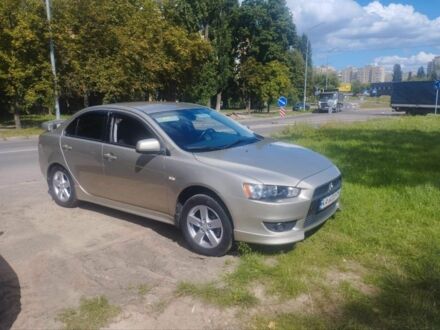 Бежевый Мицубиси Лансер, объемом двигателя 2 л и пробегом 100 тыс. км за 8000 $, фото 1 на Automoto.ua