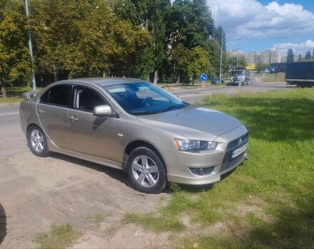 Бежевий Міцубісі Lancer, об'ємом двигуна 2 л та пробігом 100 тис. км за 8000 $, фото 1 на Automoto.ua