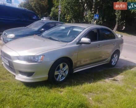 Бежевий Міцубісі Lancer, об'ємом двигуна 2 л та пробігом 100 тис. км за 8000 $, фото 1 на Automoto.ua