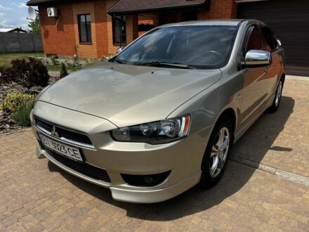 Міцубісі Lancer 2009 у Полтаві на Automoto.ua Бежевий Міцубісі Lancer, об'ємом двигуна 2 л та пробігом 101 тис. км за 7100 $, фото 1 на Automoto.ua