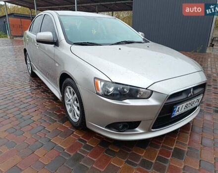 Бежевий Міцубісі Lancer, об'ємом двигуна 1.59 л та пробігом 117 тис. км за 3500 $, фото 1 на Automoto.ua