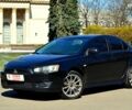 Чорний Міцубісі Lancer, об'ємом двигуна 2 л та пробігом 238 тис. км за 6999 $, фото 1 на Automoto.ua