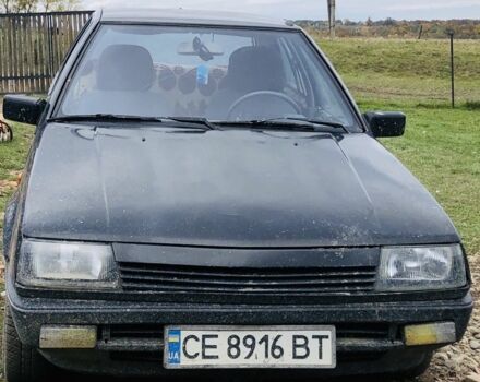 Чорний Міцубісі Lancer, об'ємом двигуна 1.4 л та пробігом 100 тис. км за 498 $, фото 1 на Automoto.ua