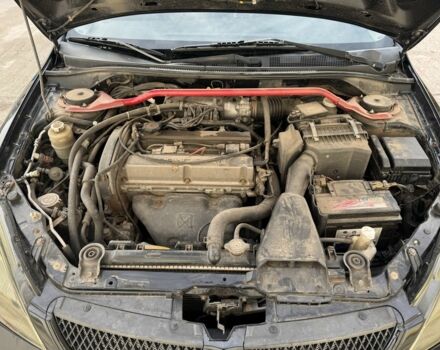 Черный Мицубиси Лансер, объемом двигателя 2 л и пробегом 3 тыс. км за 3700 $, фото 6 на Automoto.ua