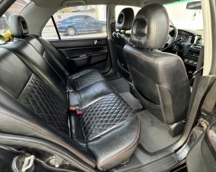 Черный Мицубиси Лансер, объемом двигателя 2 л и пробегом 3 тыс. км за 3700 $, фото 4 на Automoto.ua