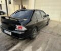 Черный Мицубиси Лансер, объемом двигателя 2 л и пробегом 3 тыс. км за 3700 $, фото 2 на Automoto.ua