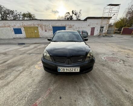 Черный Мицубиси Лансер, объемом двигателя 2 л и пробегом 3 тыс. км за 3700 $, фото 7 на Automoto.ua