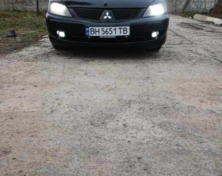 Чорний Міцубісі Lancer, об'ємом двигуна 2 л та пробігом 270 тис. км за 5000 $, фото 7 на Automoto.ua