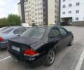 Чорний Міцубісі Lancer, об'ємом двигуна 1.6 л та пробігом 260 тис. км за 2706 $, фото 1 на Automoto.ua