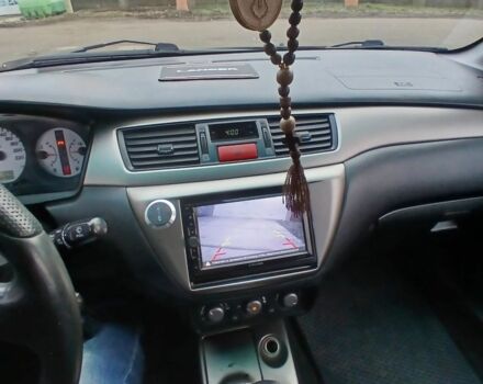Чорний Міцубісі Lancer, об'ємом двигуна 2 л та пробігом 270 тис. км за 5000 $, фото 6 на Automoto.ua