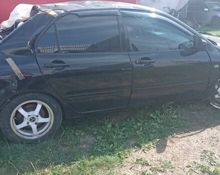 Черный Мицубиси Лансер, объемом двигателя 1.6 л и пробегом 258 тыс. км за 1600 $, фото 1 на Automoto.ua