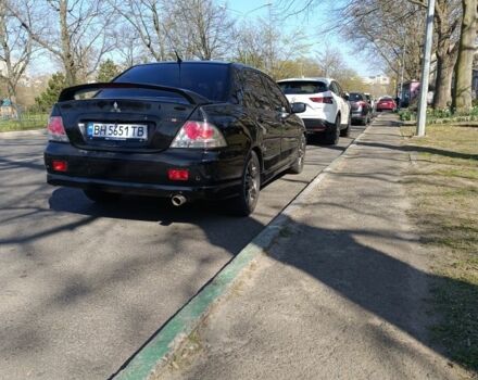 Чорний Міцубісі Lancer, об'ємом двигуна 2 л та пробігом 270 тис. км за 5000 $, фото 2 на Automoto.ua