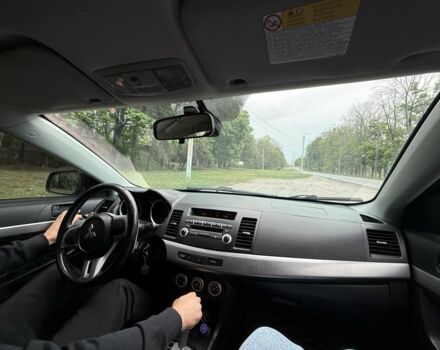 Черный Мицубиси Лансер, объемом двигателя 2 л и пробегом 190 тыс. км за 7100 $, фото 5 на Automoto.ua