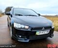 Чорний Міцубісі Lancer, об'ємом двигуна 1.8 л та пробігом 263 тис. км за 7399 $, фото 1 на Automoto.ua