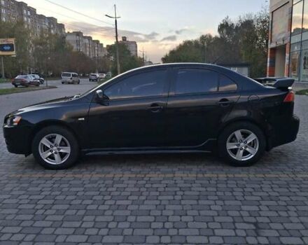 Чорний Міцубісі Lancer, об'ємом двигуна 2 л та пробігом 120 тис. км за 6950 $, фото 4 на Automoto.ua