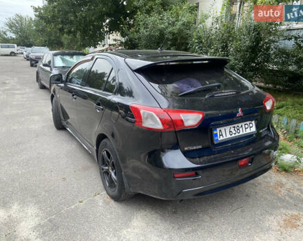 Черный Мицубиси Лансер, объемом двигателя 1.8 л и пробегом 218 тыс. км за 6800 $, фото 6 на Automoto.ua