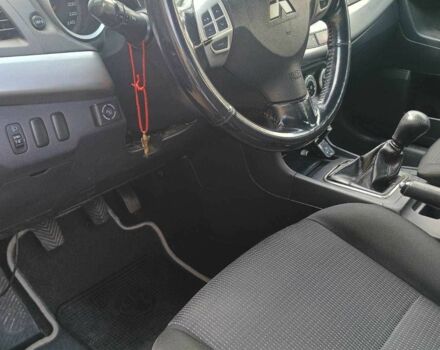 Чорний Міцубісі Lancer, об'ємом двигуна 2 л та пробігом 145 тис. км за 5200 $, фото 1 на Automoto.ua