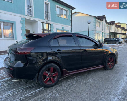 Чорний Міцубісі Lancer, об'ємом двигуна 1.8 л та пробігом 138 тис. км за 6777 $, фото 20 на Automoto.ua