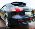 Чорний Міцубісі Lancer, об'ємом двигуна 1.8 л та пробігом 263 тис. км за 7399 $, фото 7 на Automoto.ua