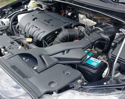 Чорний Міцубісі Lancer, об'ємом двигуна 2 л та пробігом 49 тис. км за 12500 $, фото 2 на Automoto.ua