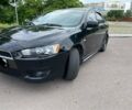 Чорний Міцубісі Lancer, об'ємом двигуна 1.8 л та пробігом 193 тис. км за 7500 $, фото 1 на Automoto.ua