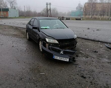 Чорний Міцубісі Lancer, об'ємом двигуна 1.6 л та пробігом 340 тис. км за 1776 $, фото 3 на Automoto.ua