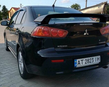 Чорний Міцубісі Lancer, об'ємом двигуна 2 л та пробігом 145 тис. км за 5200 $, фото 6 на Automoto.ua
