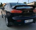 Чорний Міцубісі Lancer, об'ємом двигуна 2 л та пробігом 145 тис. км за 5200 $, фото 6 на Automoto.ua