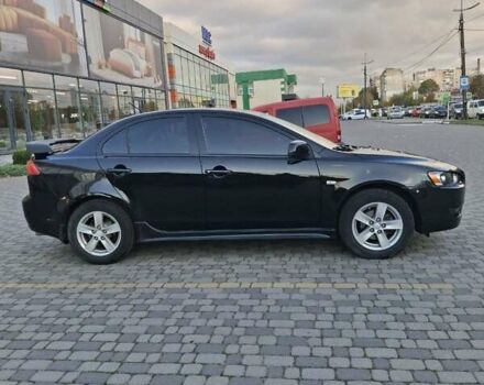 Чорний Міцубісі Lancer, об'ємом двигуна 2 л та пробігом 120 тис. км за 6950 $, фото 3 на Automoto.ua