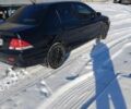 Черный Мицубиси Лансер, объемом двигателя 1.6 л и пробегом 180 тыс. км за 4400 $, фото 1 на Automoto.ua
