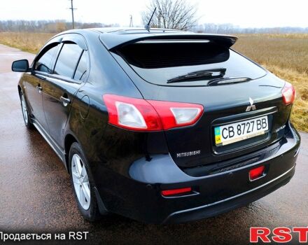 Чорний Міцубісі Lancer, об'ємом двигуна 1.8 л та пробігом 263 тис. км за 7399 $, фото 5 на Automoto.ua