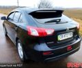 Чорний Міцубісі Lancer, об'ємом двигуна 1.8 л та пробігом 263 тис. км за 7399 $, фото 5 на Automoto.ua