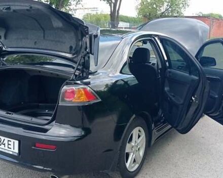 Чорний Міцубісі Lancer, об'ємом двигуна 2 л та пробігом 49 тис. км за 12500 $, фото 4 на Automoto.ua