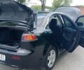 Чорний Міцубісі Lancer, об'ємом двигуна 2 л та пробігом 49 тис. км за 12500 $, фото 4 на Automoto.ua
